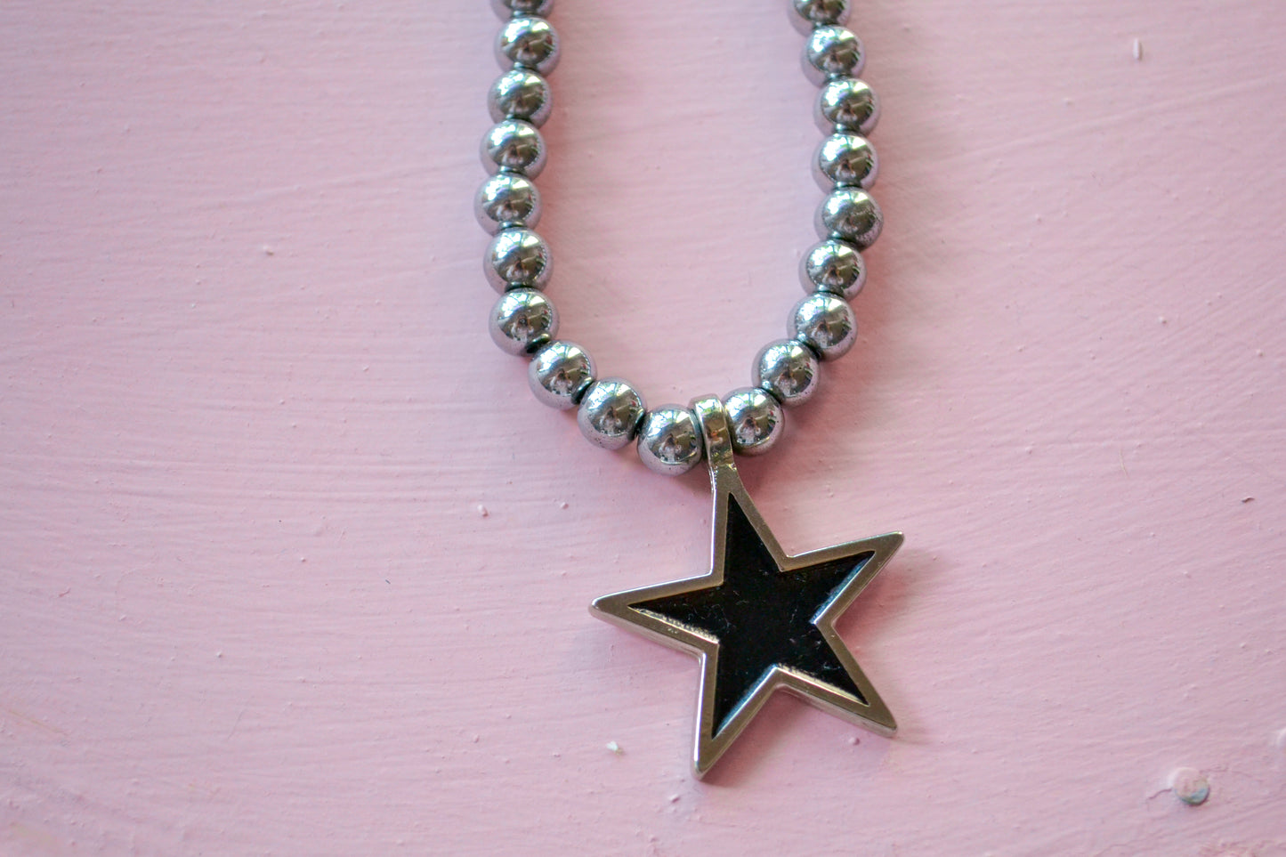 Collar estrella negra